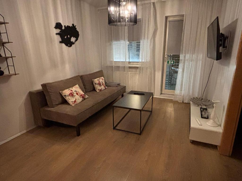 Posezení v ubytování Hafnarstræti 100, Downtown Apartment
