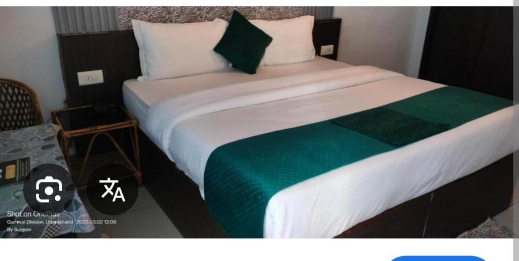 Ένα ή περισσότερα κρεβάτια σε δωμάτιο στο Hotel Devoy inn