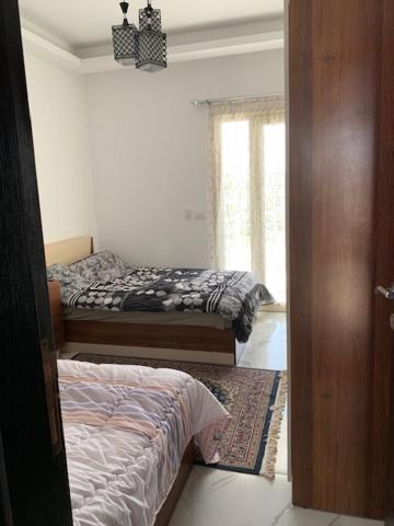 Postel nebo postele na pokoji v ubytování Sky Star Villa 30