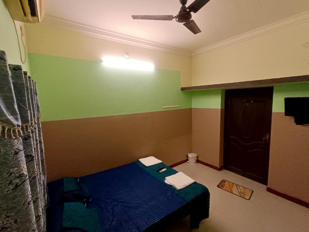 En eller flere senge i et værelse på Le Casa Stay