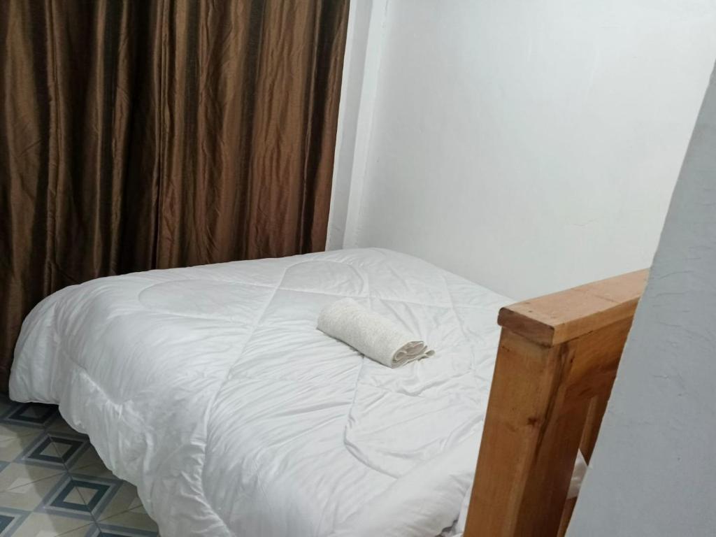 Postel nebo postele na pokoji v ubytování Savannah Apartments