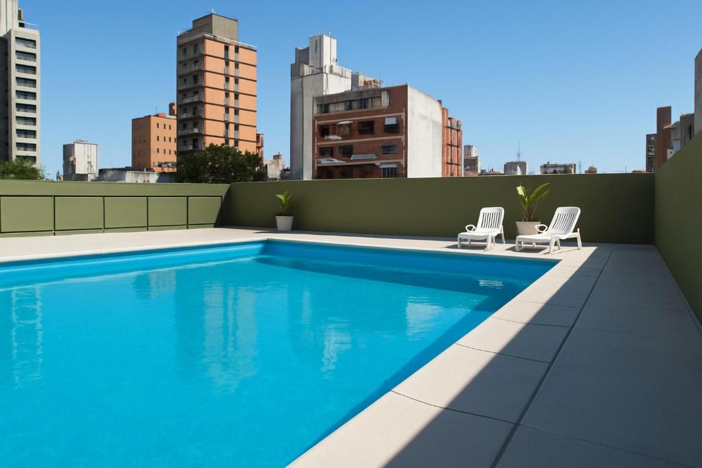 Πισίνα στο ή κοντά στο Moderno departamento céntrico, con piscina-Barrio Norte