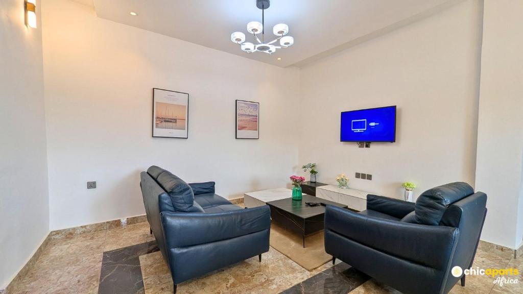 TV a/nebo společenská místnost v ubytování Chic & spacious studio with parking