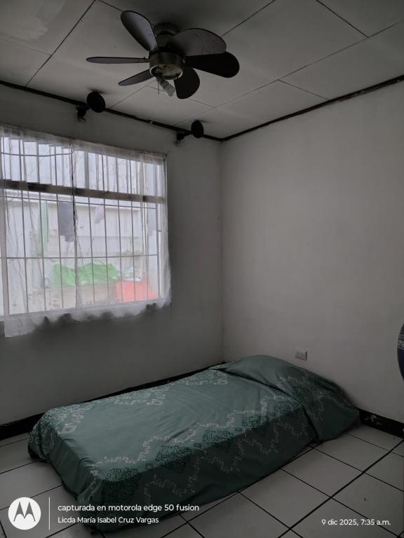 Una cama o camas en una habitación de Lidia's House