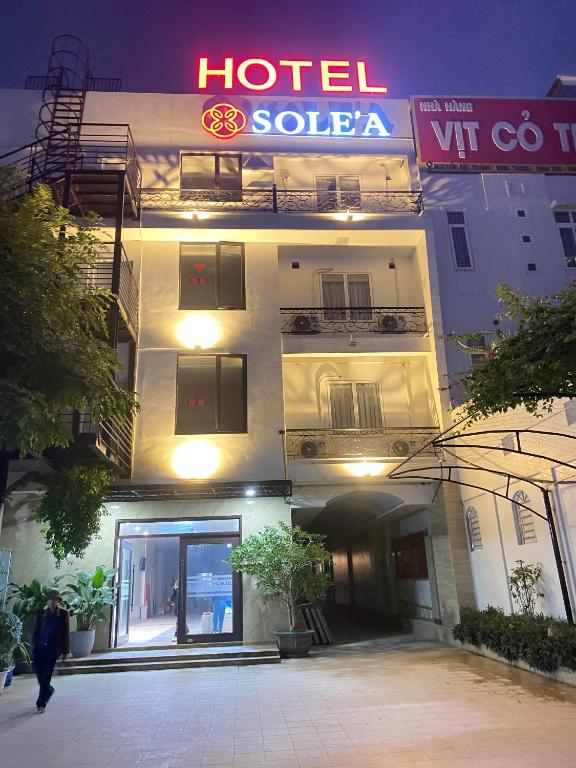 a hotel with a sign on the side of a building at Khách sạn Sole'a VĨNH YÊN in Vĩnh Phúc