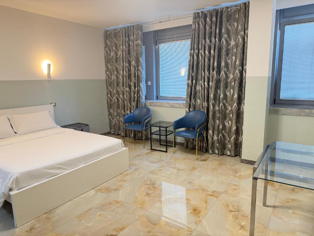 Ένα ή περισσότερα κρεβάτια σε δωμάτιο στο HHBB hotel