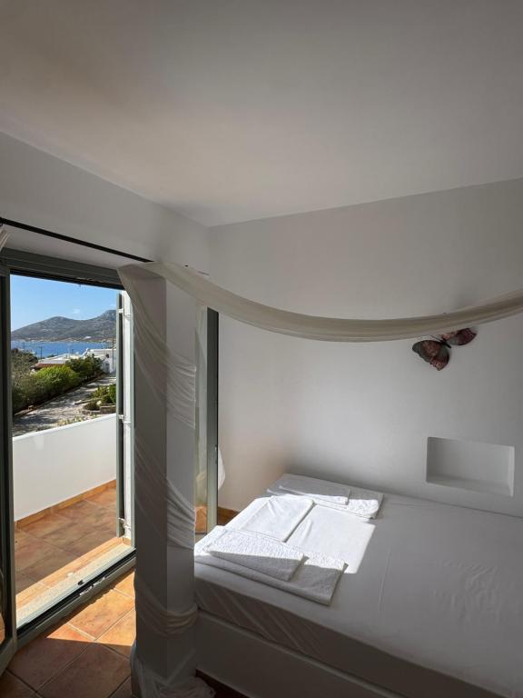 Postel nebo postele na pokoji v ubytování Niriedes Villas