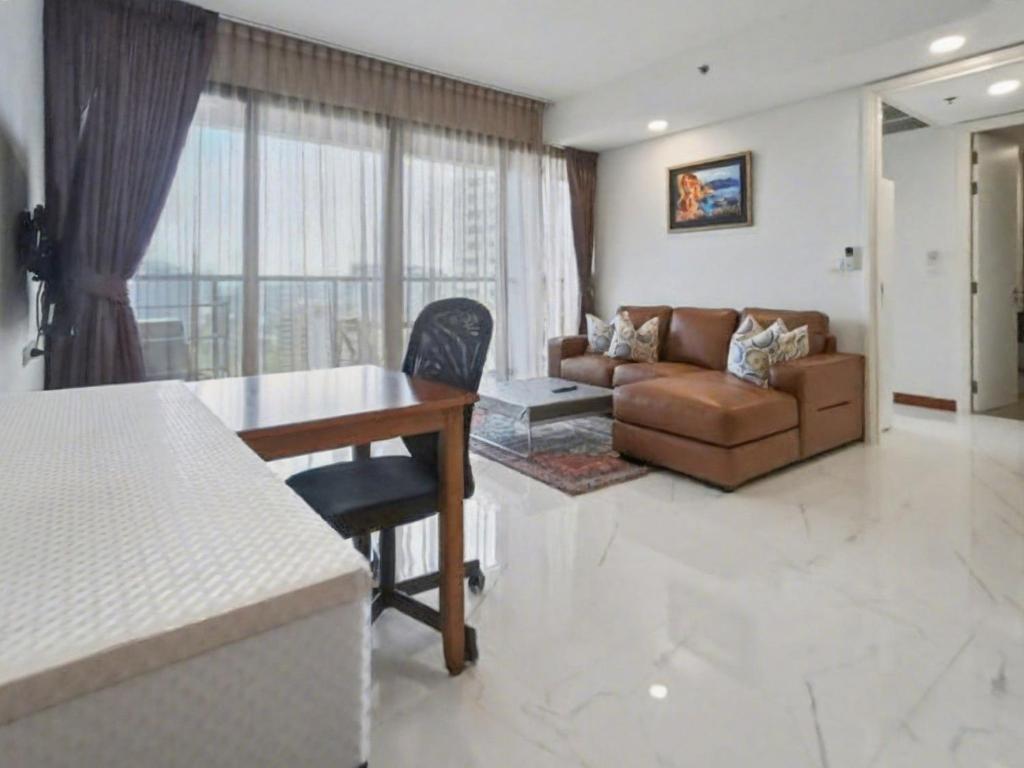 Et opholdsområde på Luxury Large One Bedroom Seaview Serviced Apartment at Wongamat, Pattaya