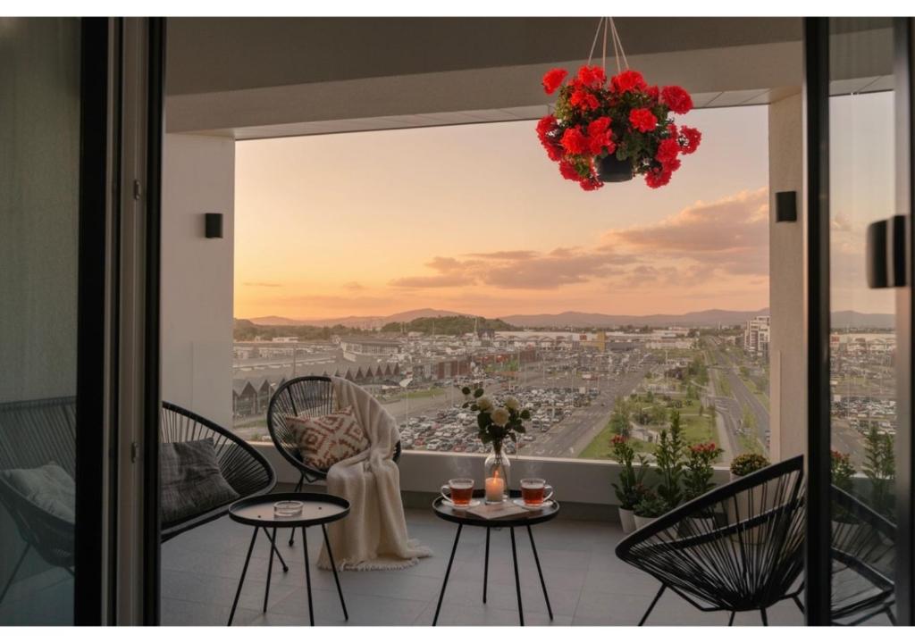 En balkon eller terrasse på Apart B&V 55 Qualis - Luxury Mountain Escape