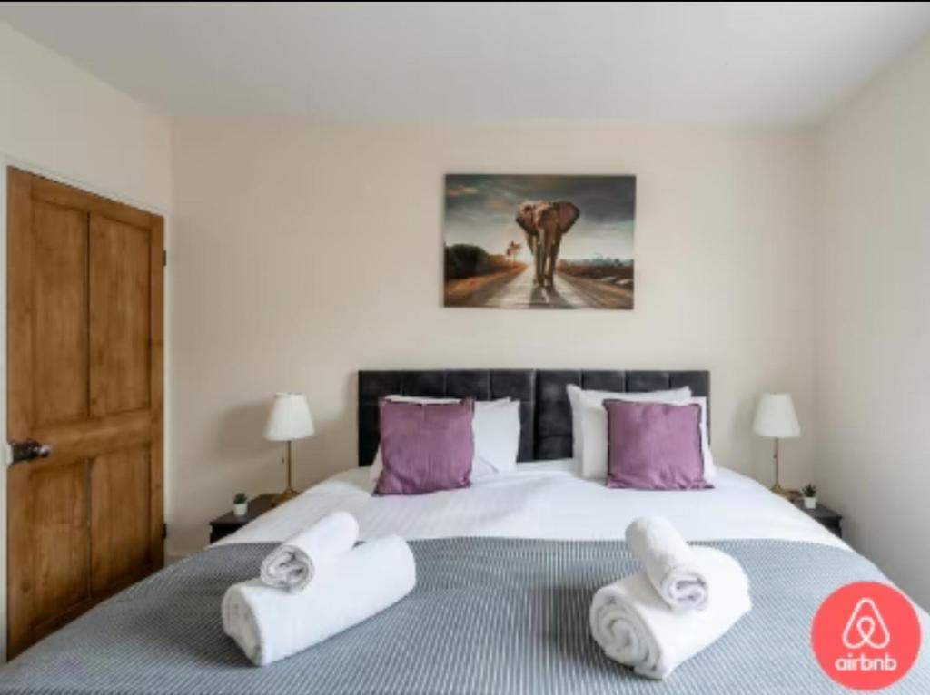 Ένα ή περισσότερα κρεβάτια σε δωμάτιο στο Reading retreat