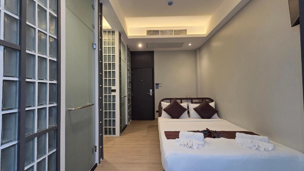 تصویر اتاق‌های Warm Pillow Hotel Bangkok - تصویر ۲