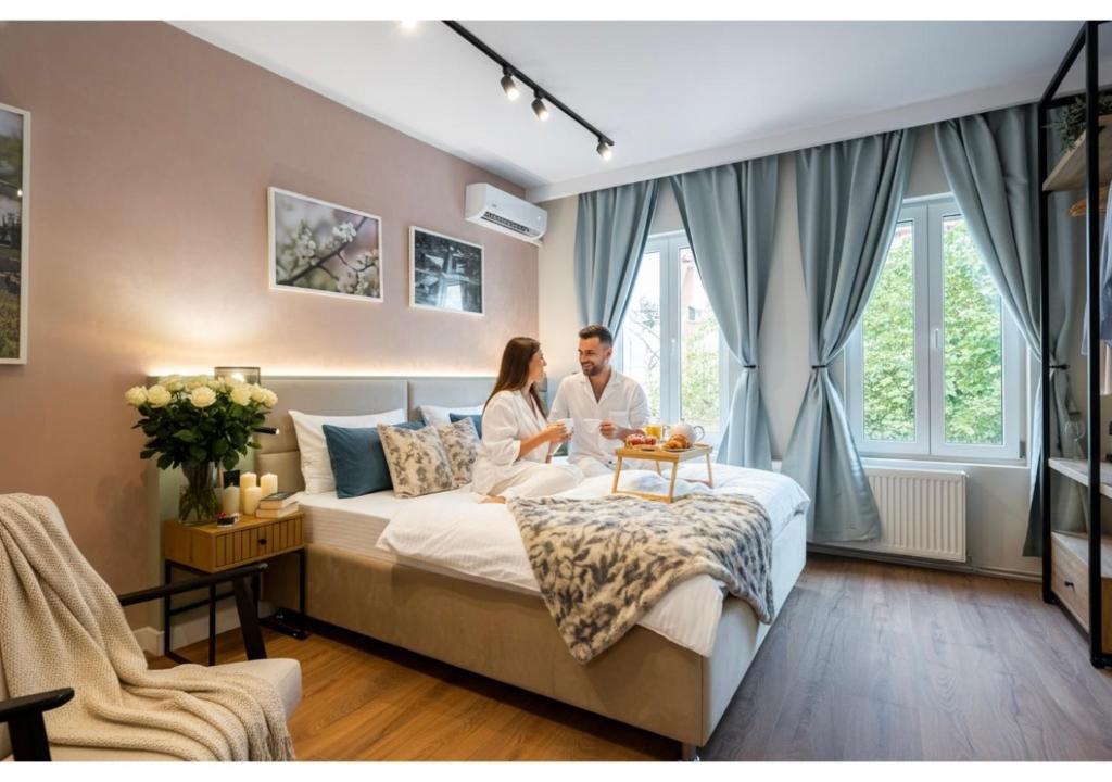 Postel nebo postele na pokoji v ubytování Luxury Apart-Hotel