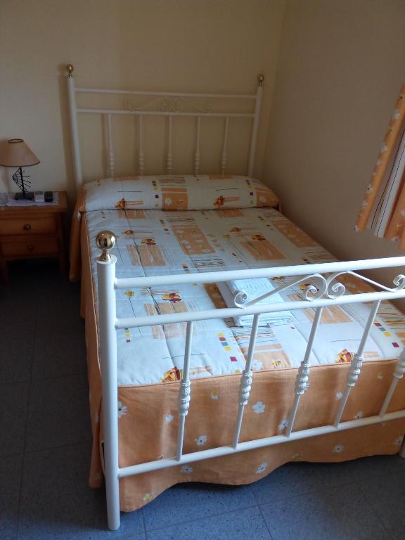 Postel nebo postele na pokoji v ubytování Hostal Miraflor de las Cadenas