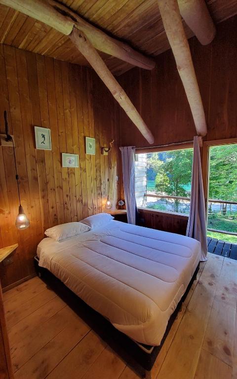 Postel nebo postele na pokoji v ubytování Refugio Salvatierra