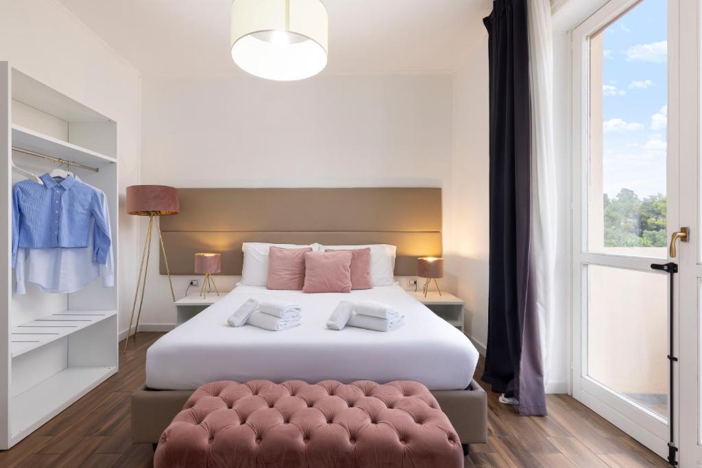 Ένα ή περισσότερα κρεβάτια σε δωμάτιο στο Mapi’s Rooms