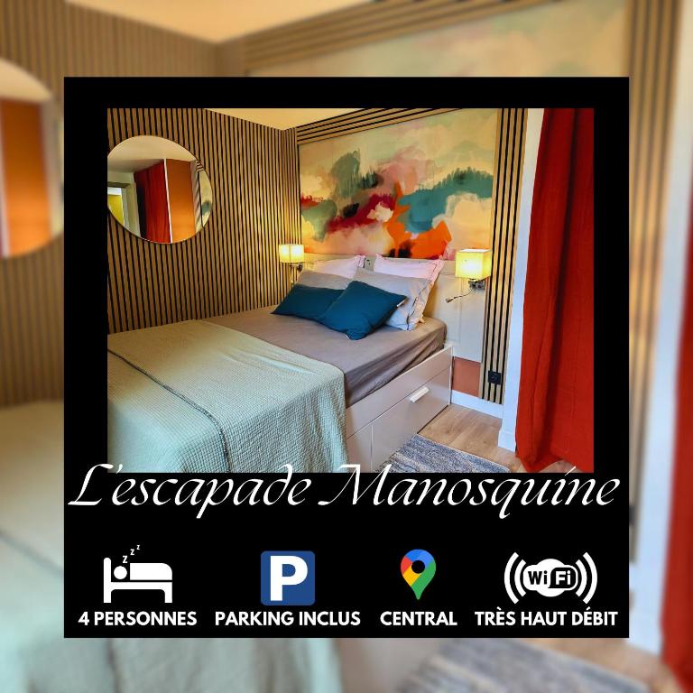 a picture of a bedroom with a bed and a painting at L'Escapade Manosquine - Parking Inclus in Manosque