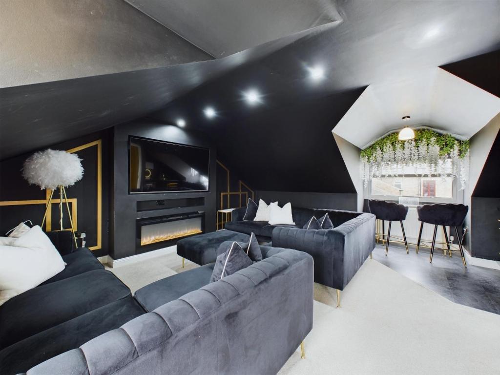 Et opholdsområde på Queen Elizabeth Penthouse Sleeps 6-8