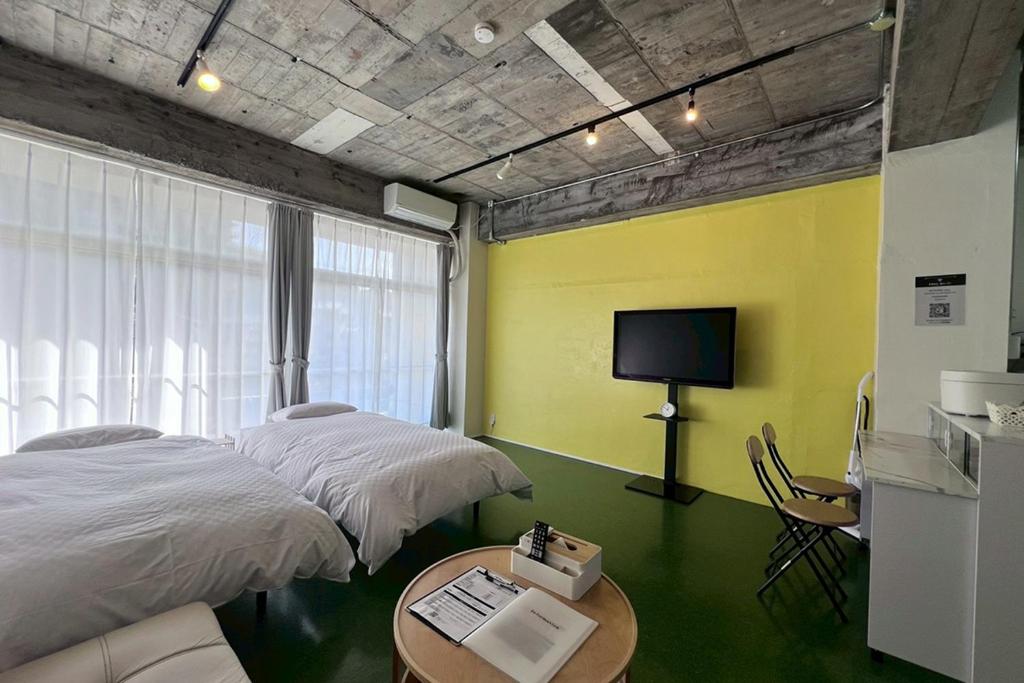 TV a/nebo společenská místnost v ubytování 白浜ペットフレンドリーハウス