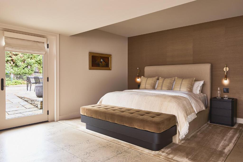 Postel nebo postele na pokoji v ubytování Stockton Inn