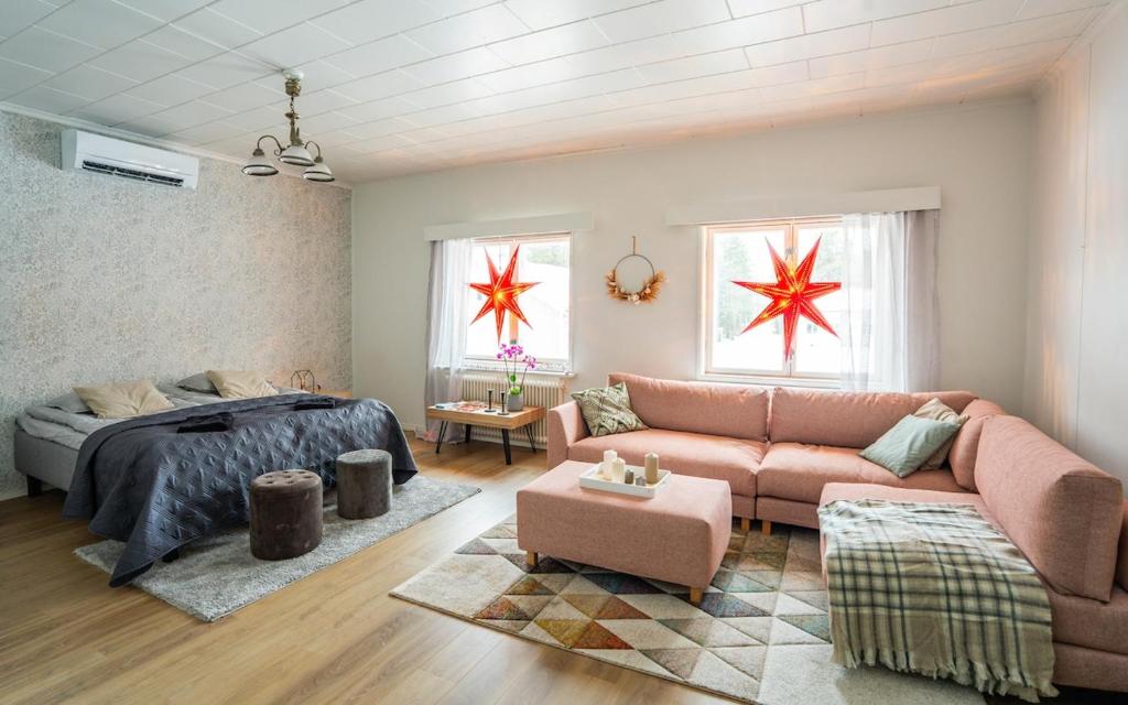 Et opholdsområde på Portimo Oldschool Apartment near Rovaniemi