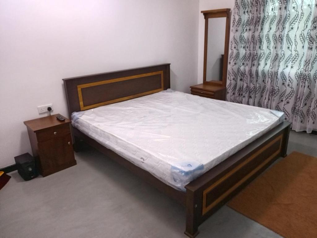 Postel nebo postele na pokoji v ubytování Pipuni villa