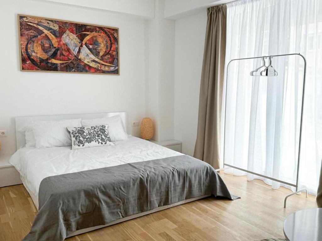 Ένα ή περισσότερα κρεβάτια σε δωμάτιο στο Cvet Apartment 1