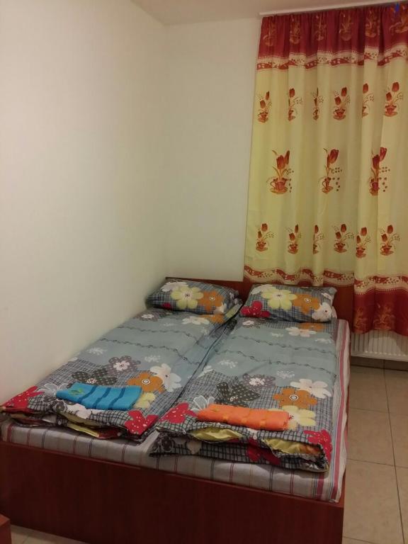 Postel nebo postele na pokoji v ubytování M+D Hotel