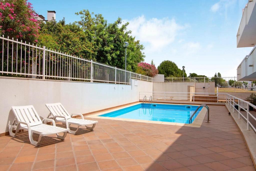 Swimmingpoolen hos eller tæt på 1I Apt Alecrim