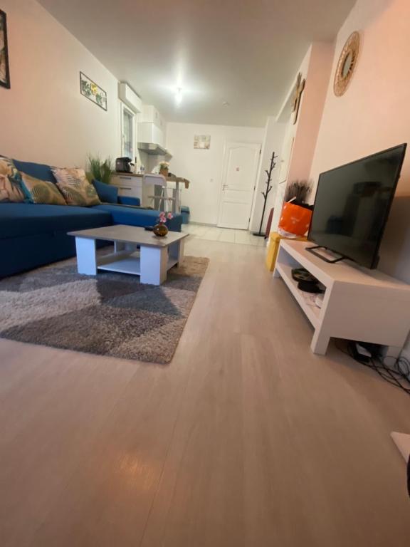 Χώρος καθιστικού στο Superbe Appartement Proche Paris