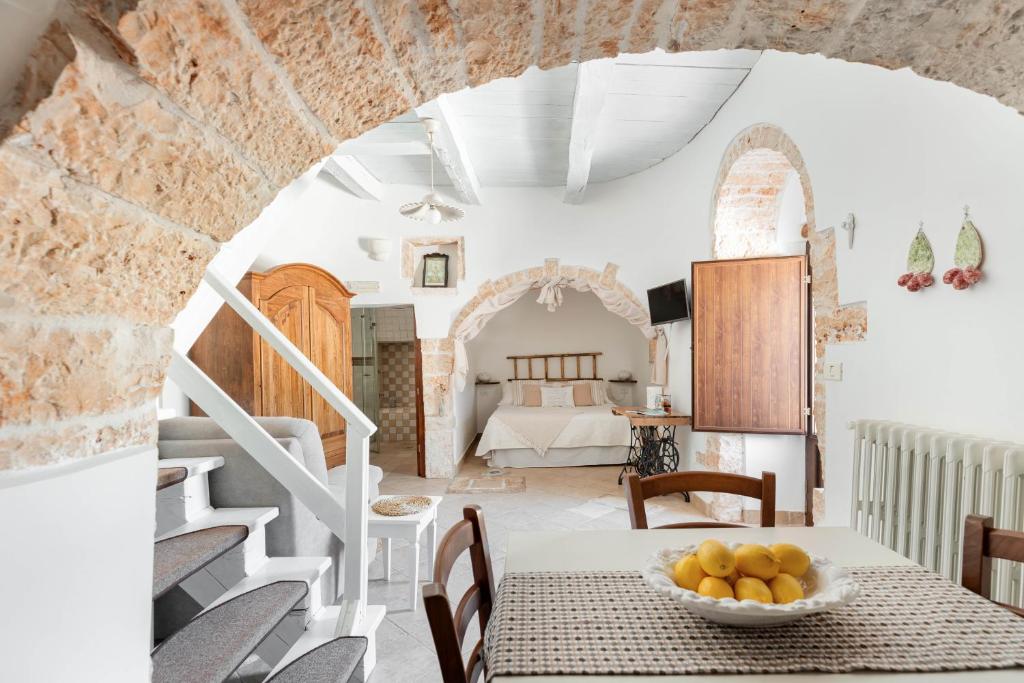 Et opholdsområde på Trullo Suite Tulipano ad Alberobello