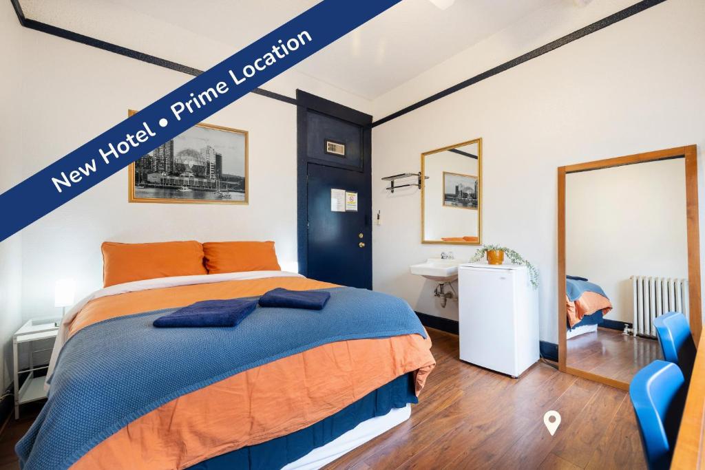 Ένα ή περισσότερα κρεβάτια σε δωμάτιο στο The Guesthouse Vancouver Downtown