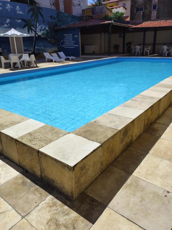 Swimmingpoolen hos eller tæt på APARTAMENTO EM ICARAÍ COM PISCINA 500mt DA PRAIA