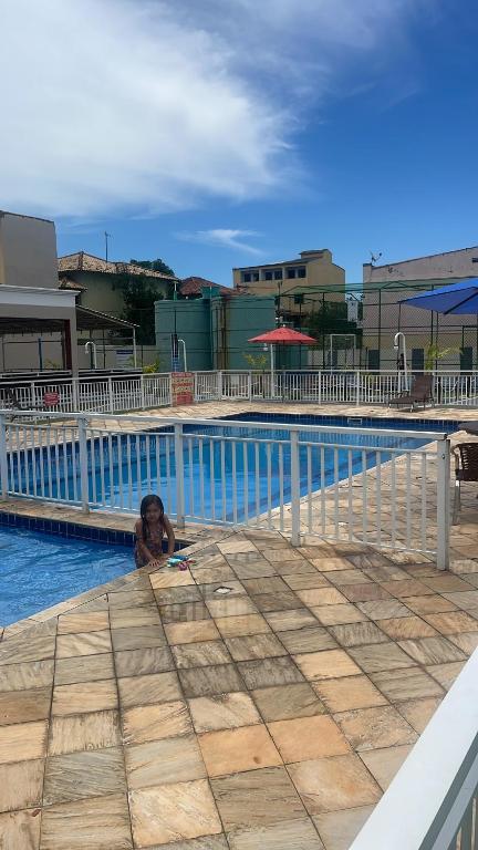 La alberca dentro o cerca de Apartamento condomínio maré d oro