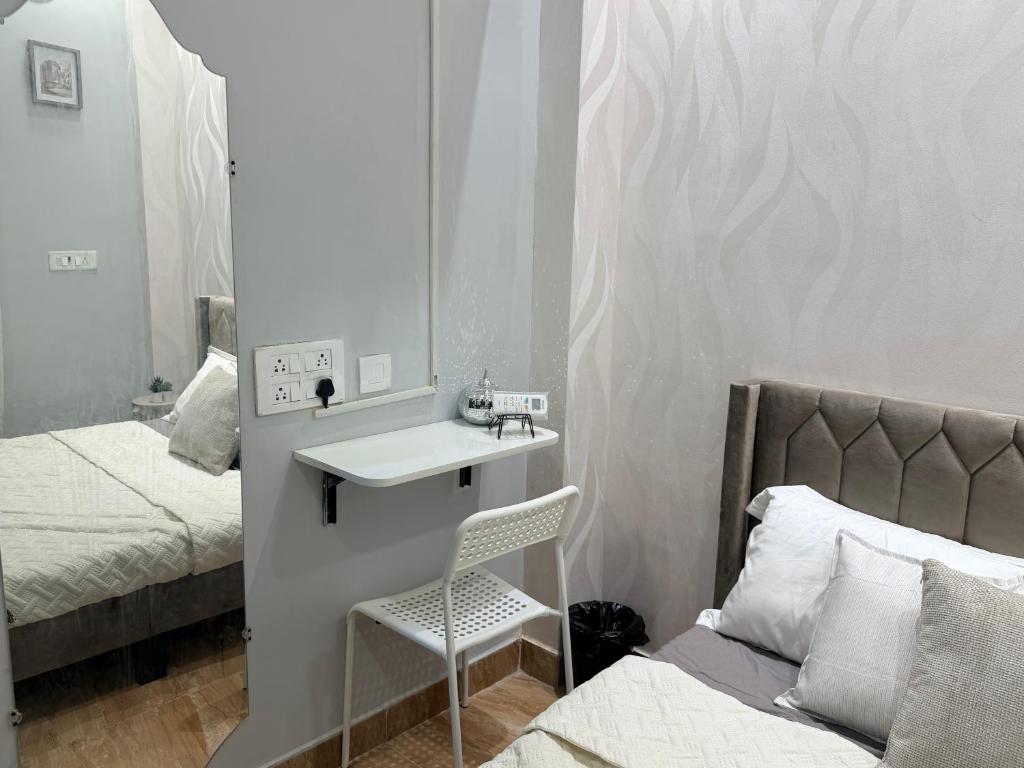 En eller flere senge i et værelse på Faaloon