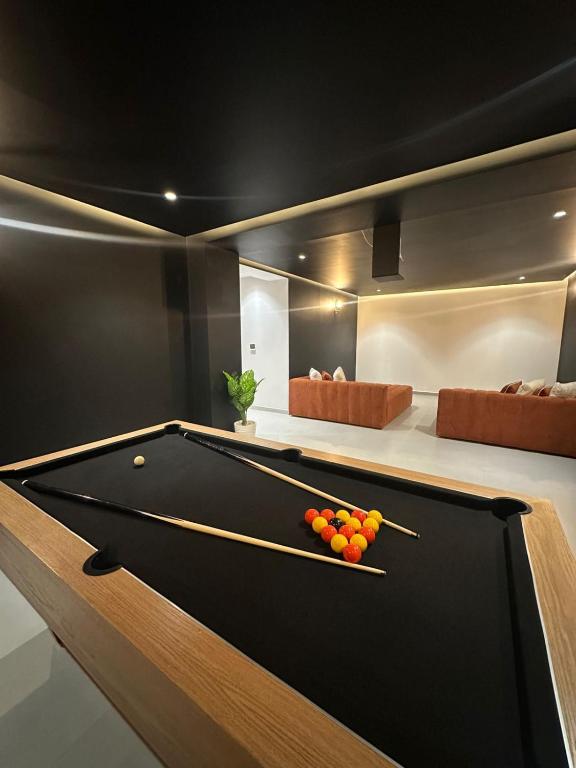 a billiard room with a pool table in it at Luxury Villa Marrakech in Marrakesh