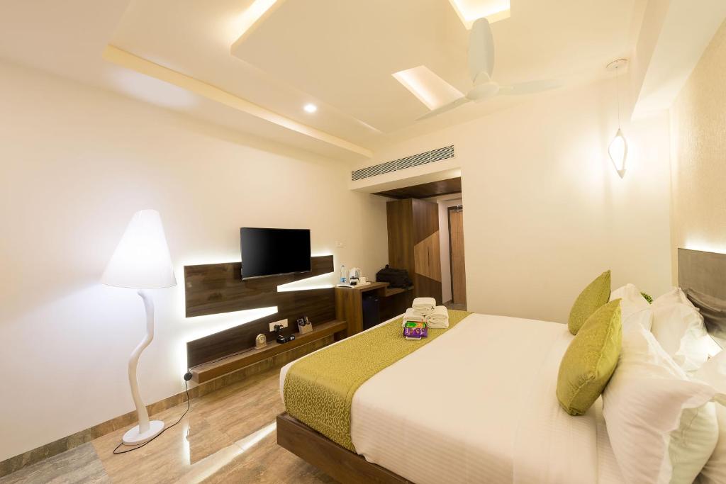 TV a/nebo společenská místnost v ubytování Hotel Chenthur Park