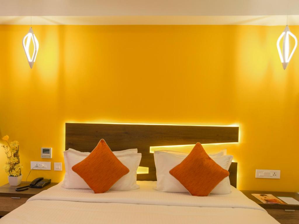 Postel nebo postele na pokoji v ubytování Hotel Chenthur Park