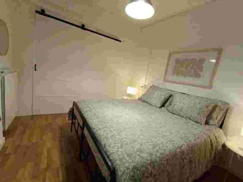 Ένα ή περισσότερα κρεβάτια σε δωμάτιο στο Civico46