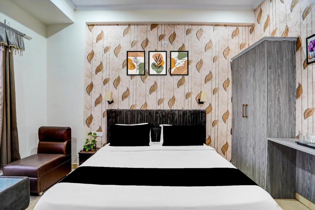 Ένα ή περισσότερα κρεβάτια σε δωμάτιο στο Hotel O DUNARA