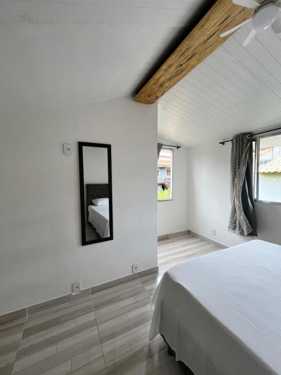 Postel nebo postele na pokoji v ubytování Casinhas da toca