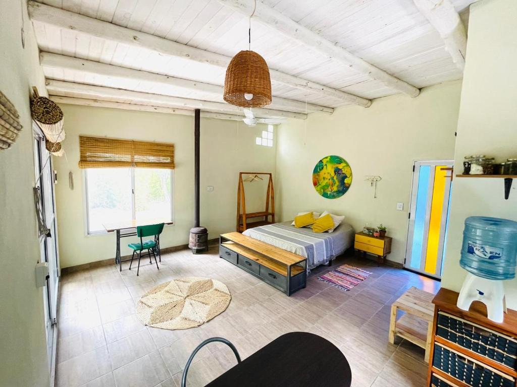 En eller flere senge i et værelse på Mini Loto