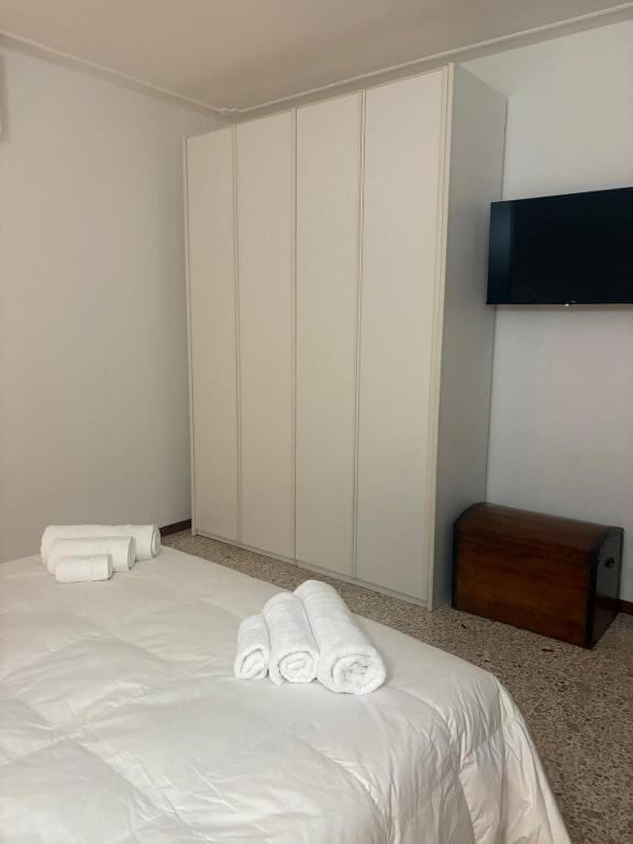 Giường trong phòng chung tại La Casa di Anna