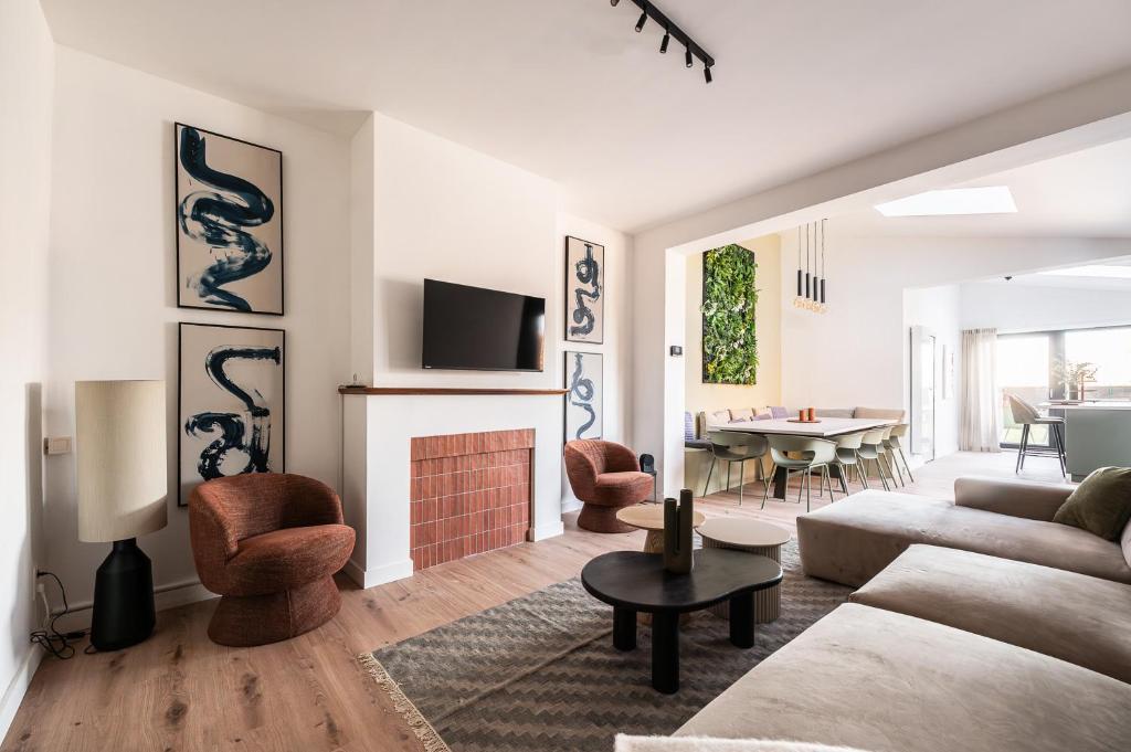 Et tv og/eller underholdning på Spacious 5-room house near Brussels with private parking