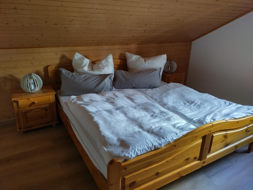 Кровать или кровати в номере Dorfschönheit