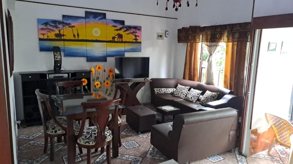 a living room with a couch and a table at samargo in Cali