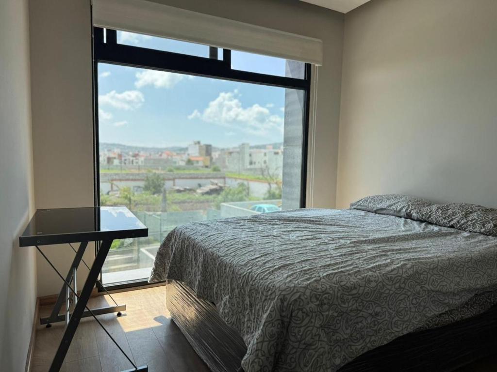 Ένα ή περισσότερα κρεβάτια σε δωμάτιο στο Hermoso departamento