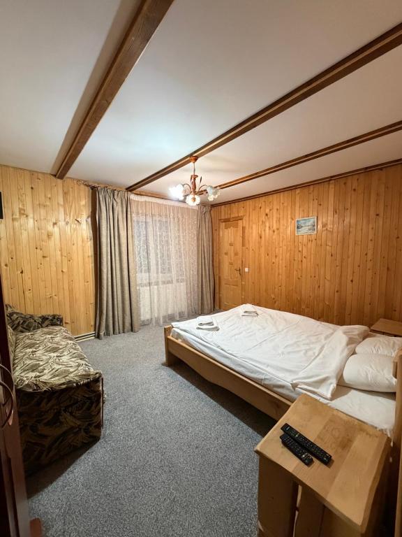 Postel nebo postele na pokoji v ubytování Guest house Zatishniy dvir