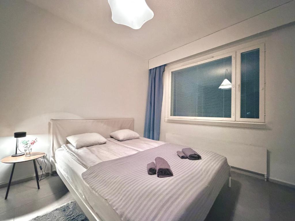 En eller flere senge i et værelse på Northern Seasons - Outokumpu