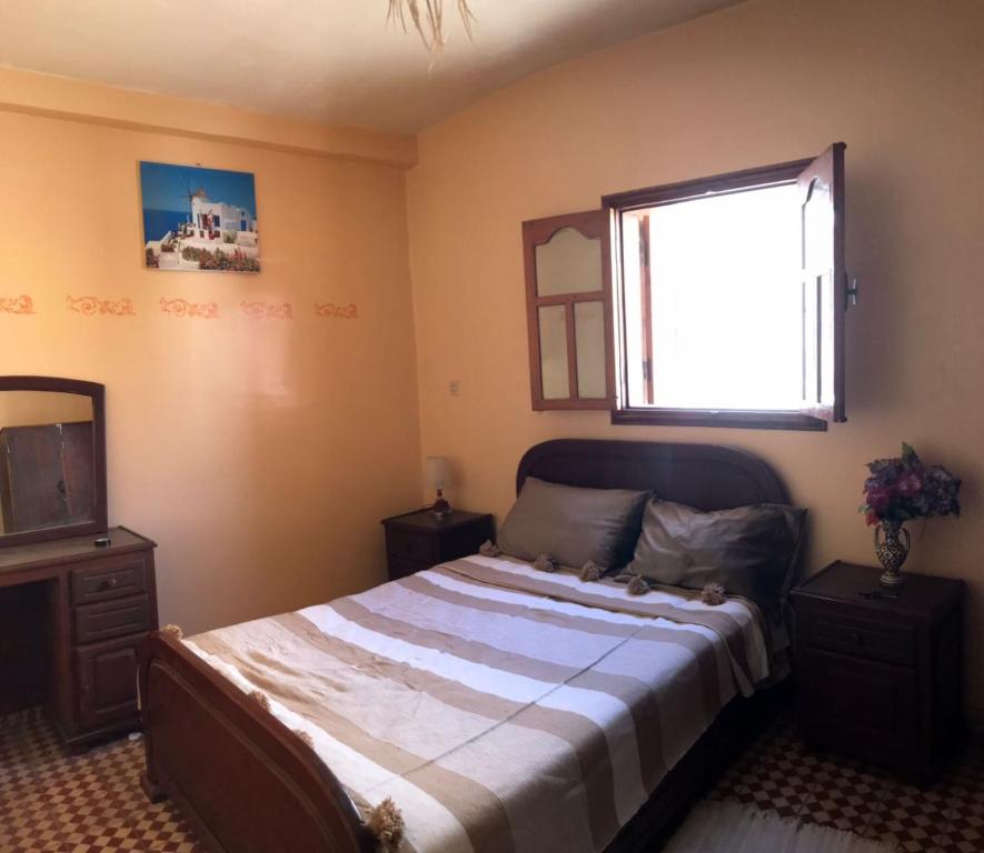 Postel nebo postele na pokoji v ubytování LoveWave House