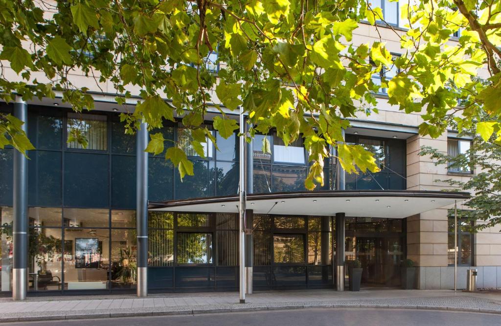 an external view of a building at Hotel Magdeburg City Center by Leonardo Hotels in Magdeburg
